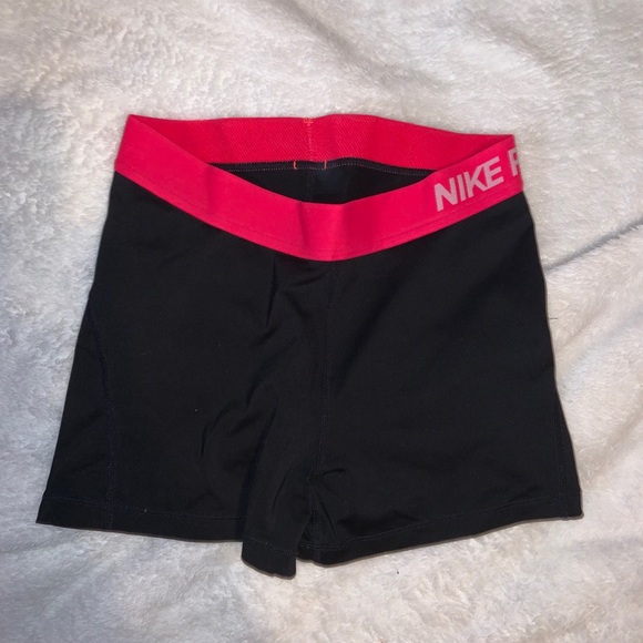 Nike Pants - Nike running spandex shorts with pink trim